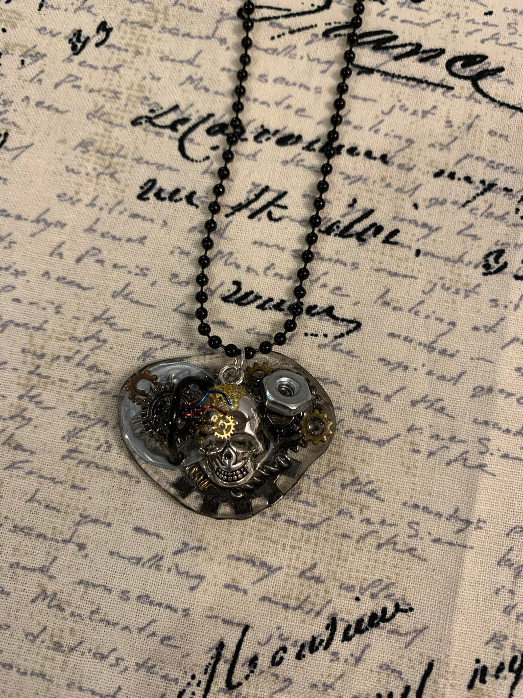 Steampunk charging skull necklace