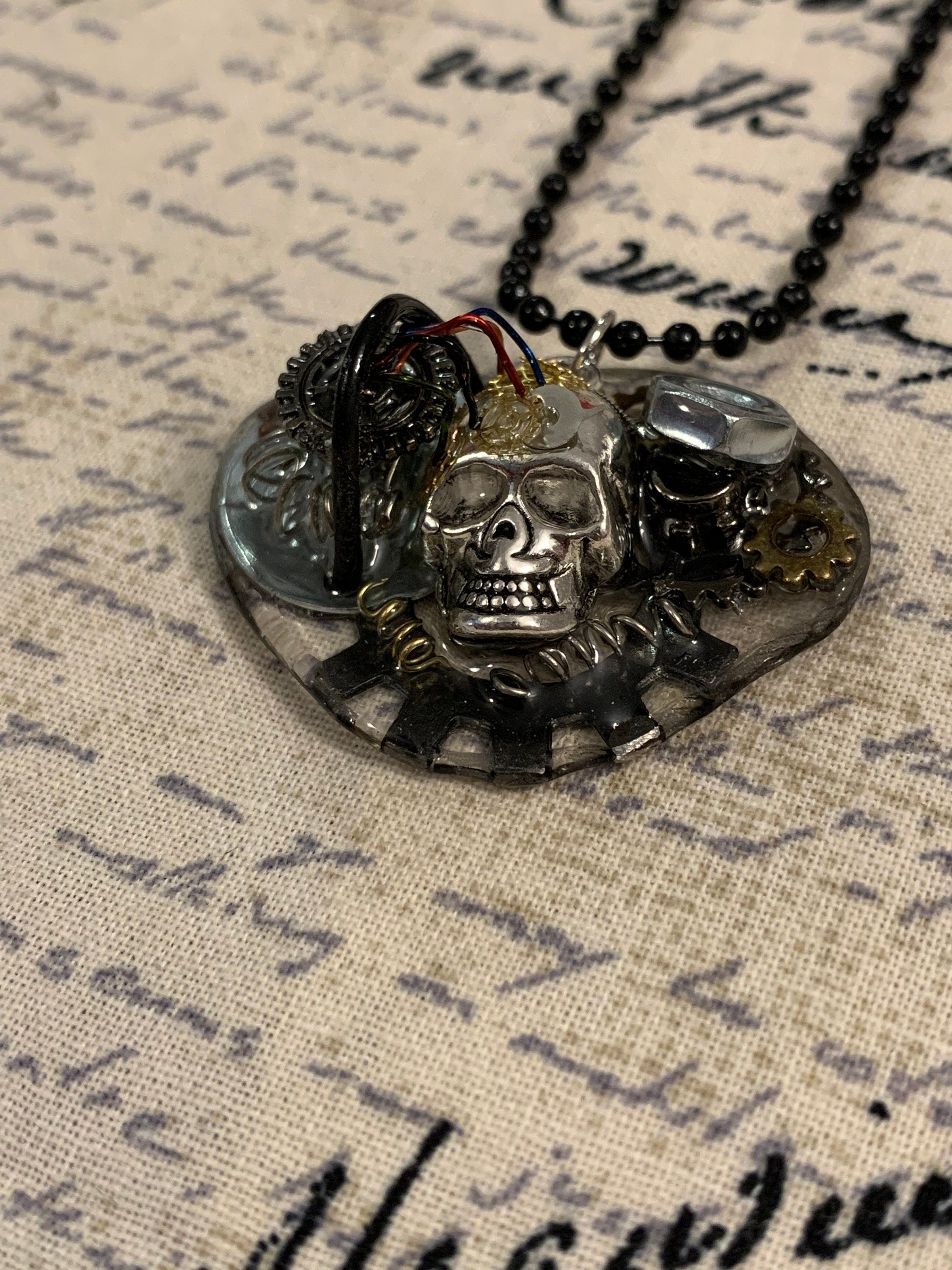 Steampunk charging skull necklace