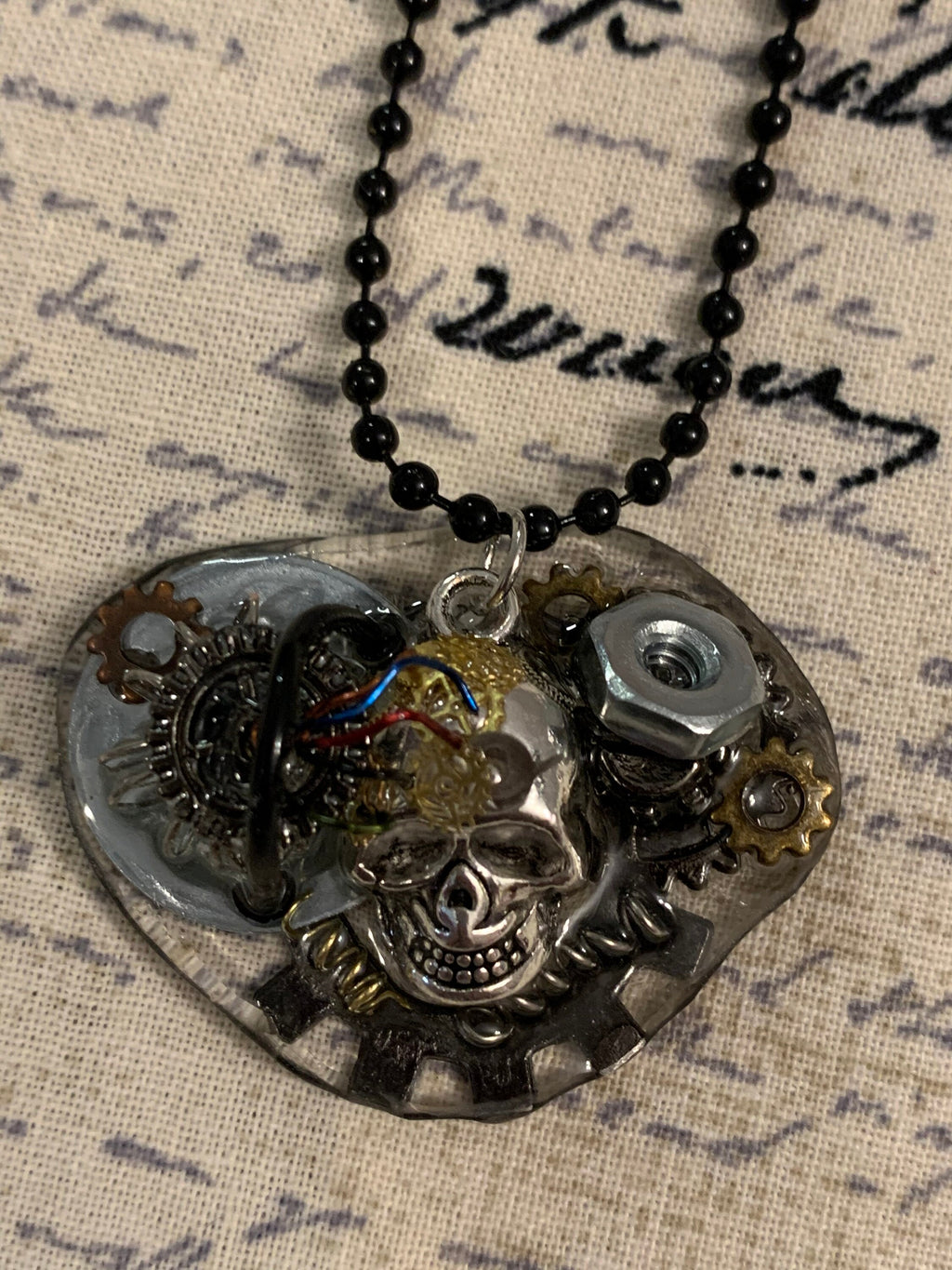 Steampunk charging skull necklace