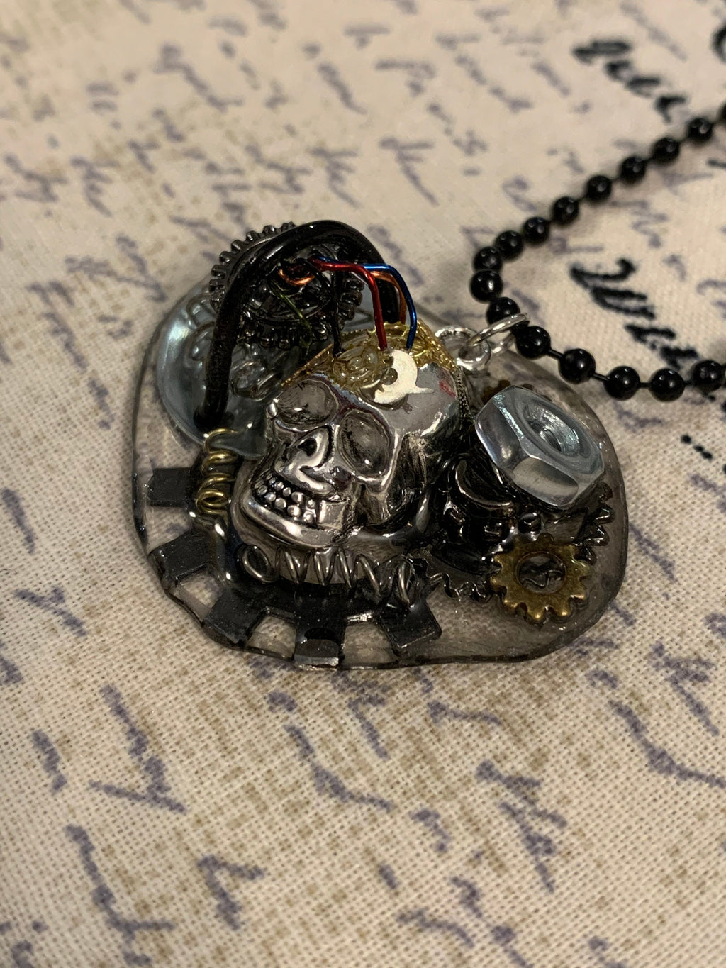 Steampunk charging skull necklace