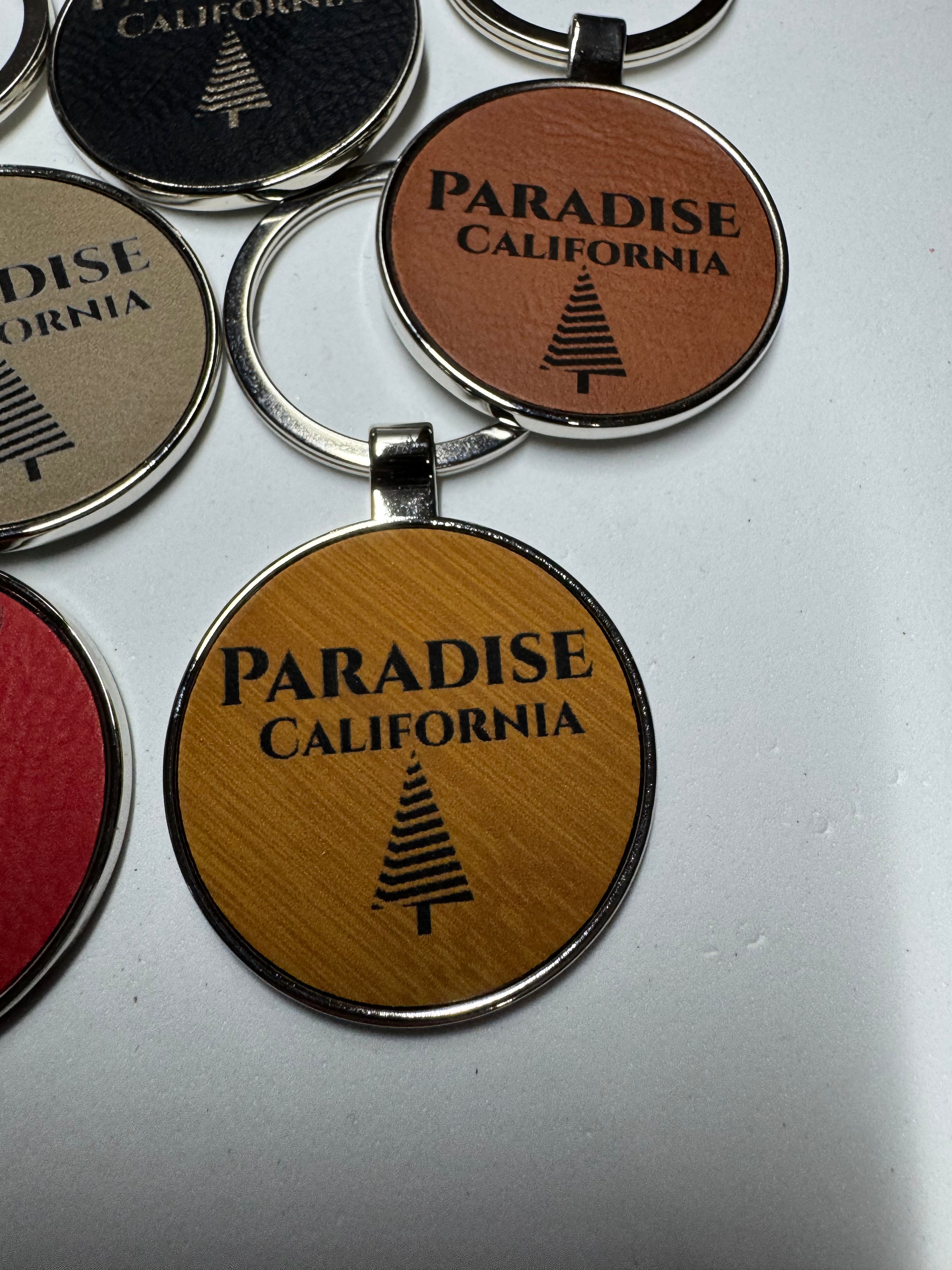 Metal Leatherette Paradise Keychain