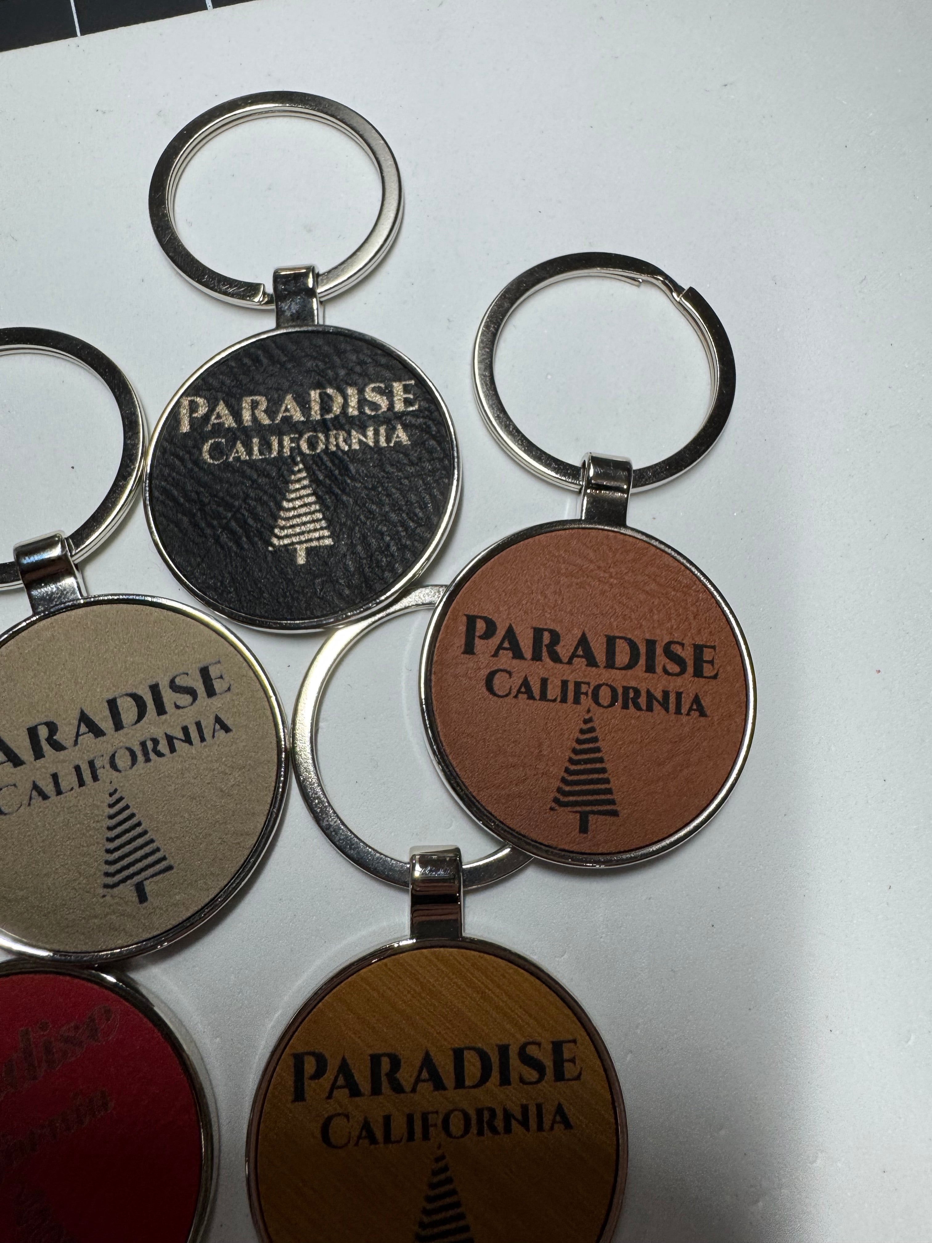 Metal Leatherette Paradise Keychain