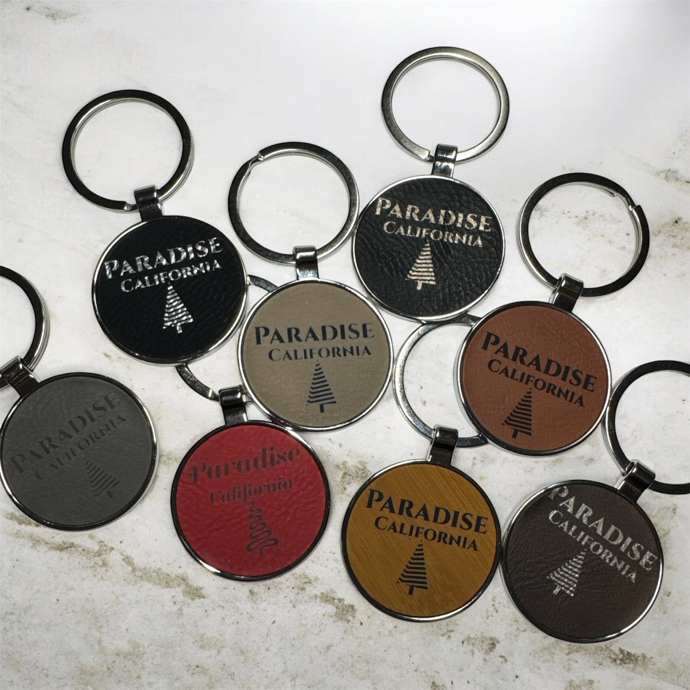 Metal Leatherette Paradise Keychain