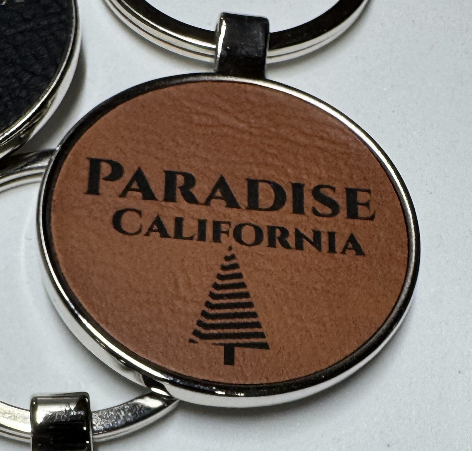 Metal Leatherette Paradise Keychain