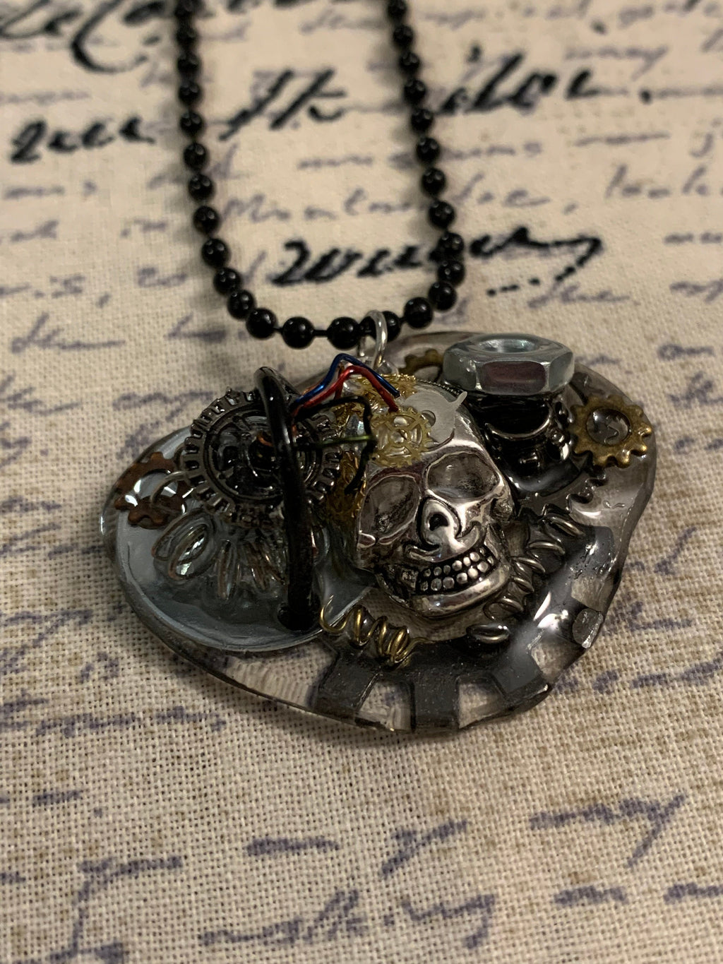 Steampunk charging skull necklace