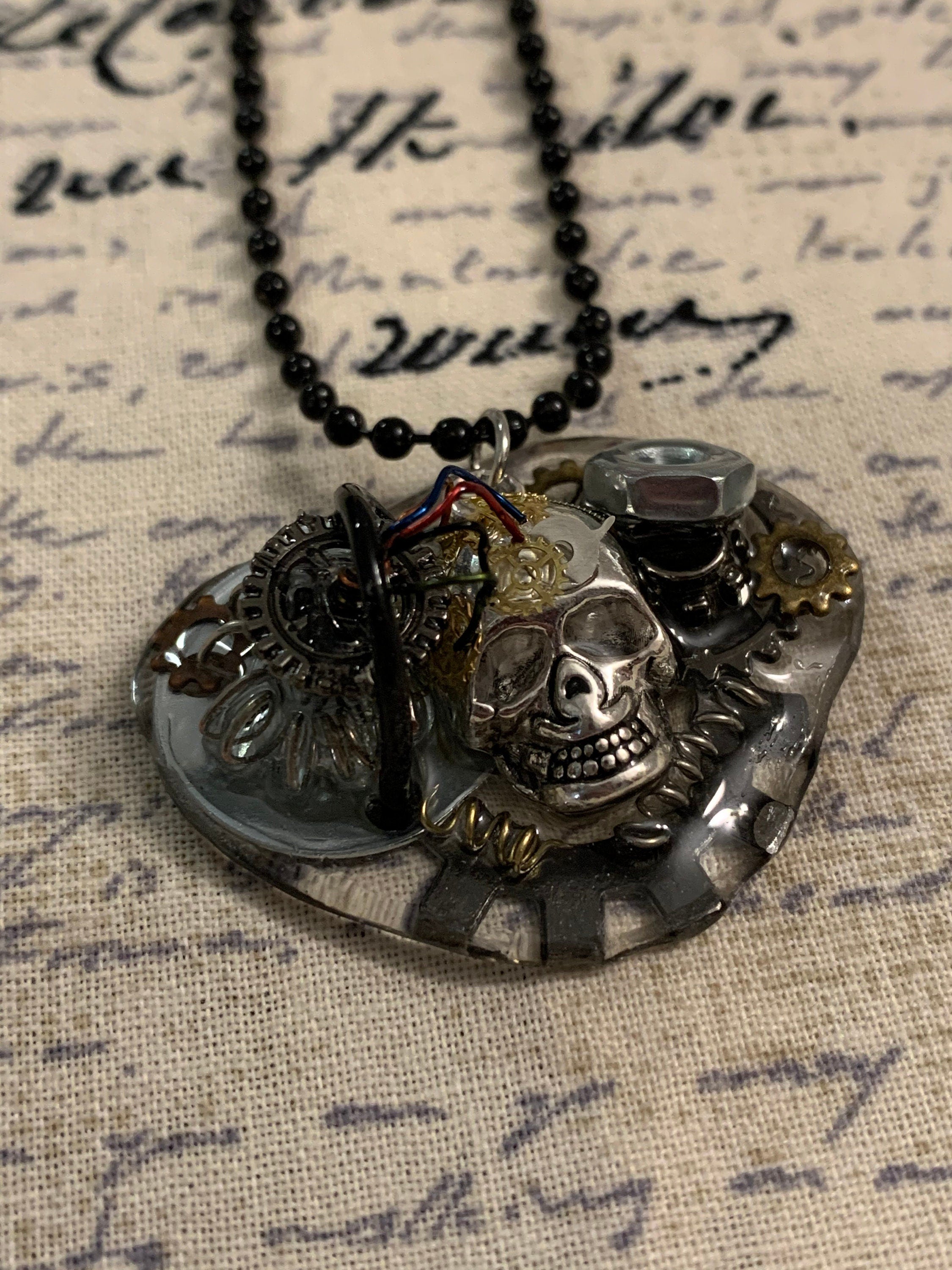Steampunk charging skull necklace
