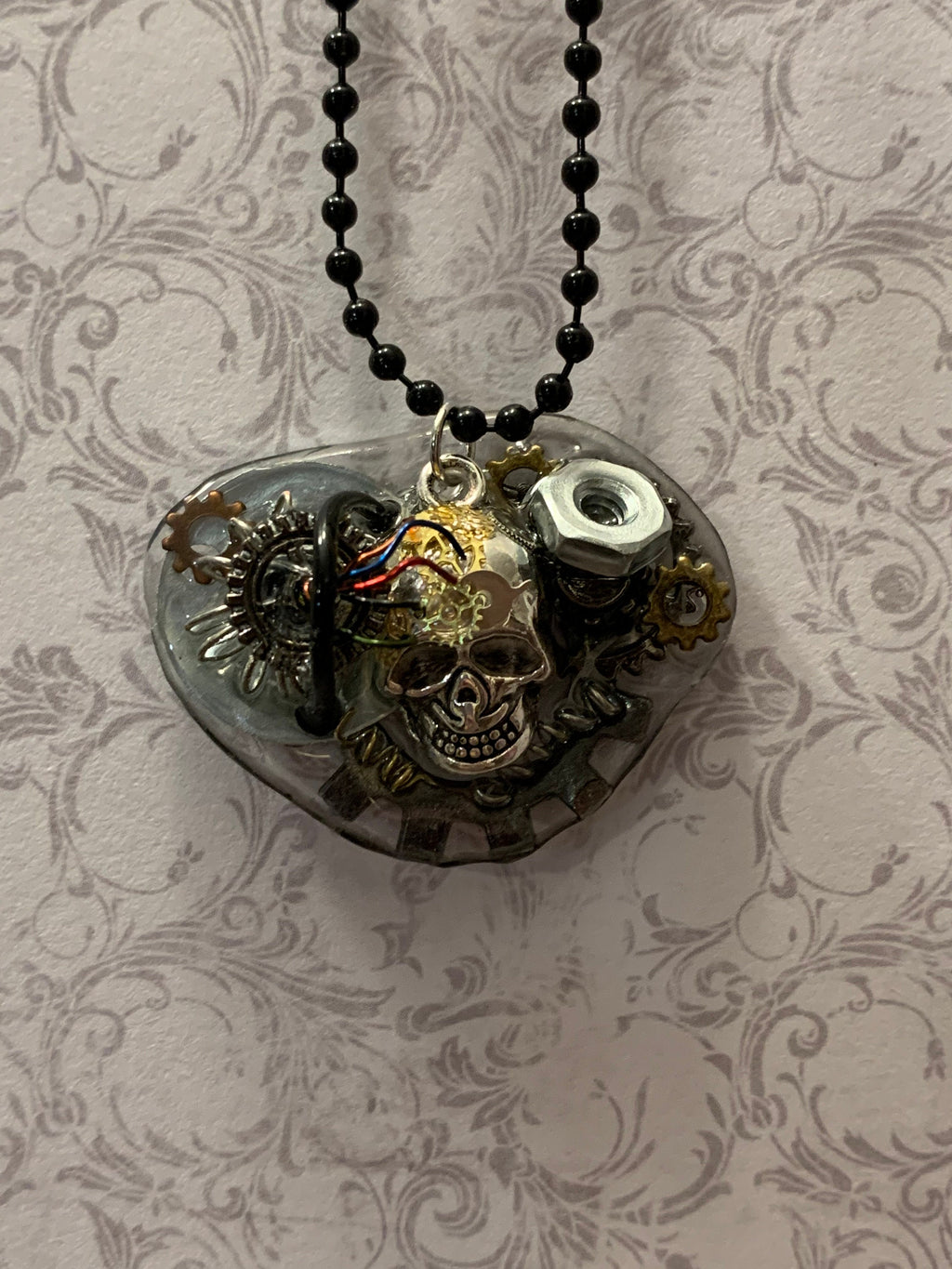Steampunk charging skull necklace