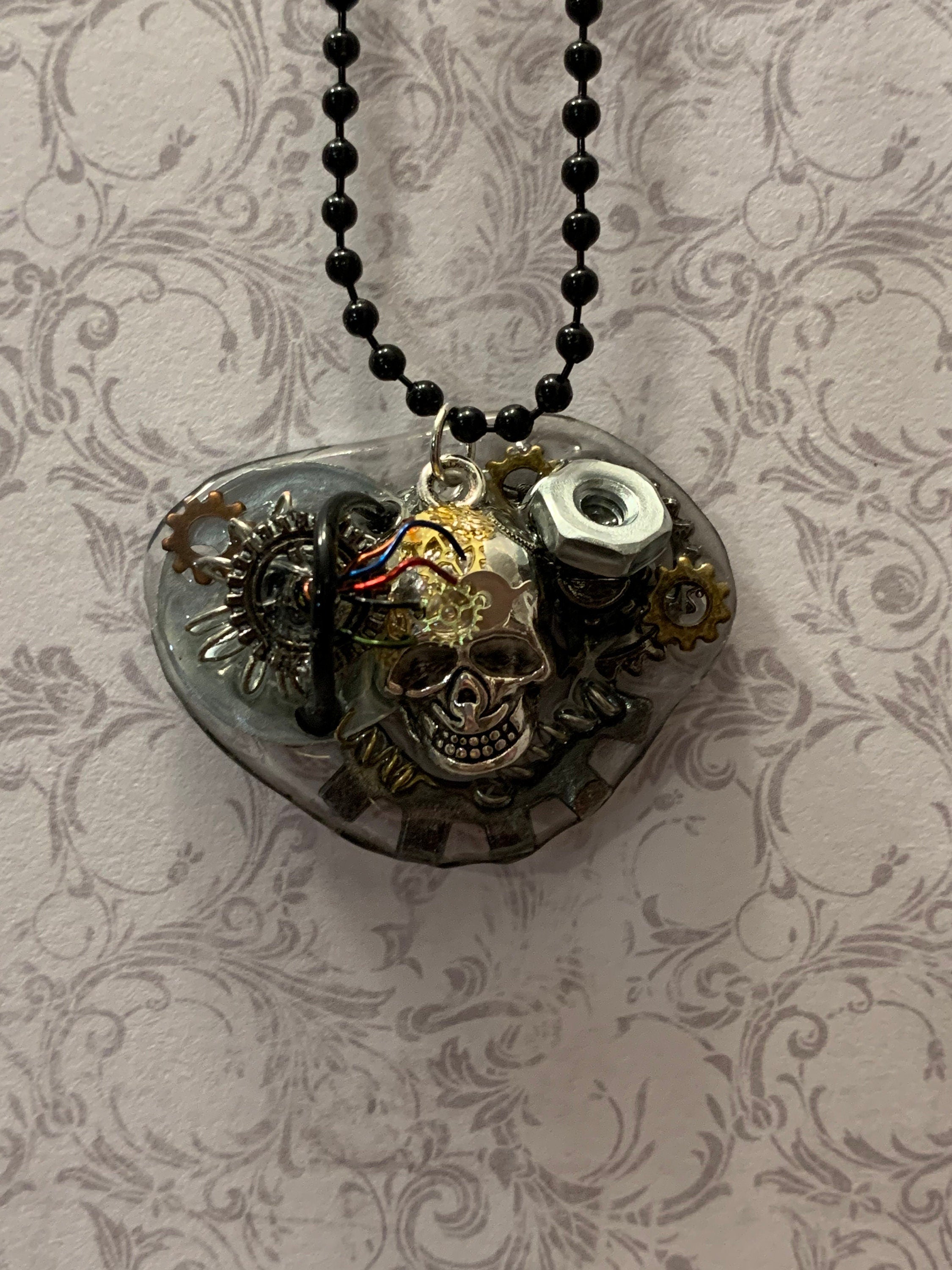 Steampunk charging skull necklace