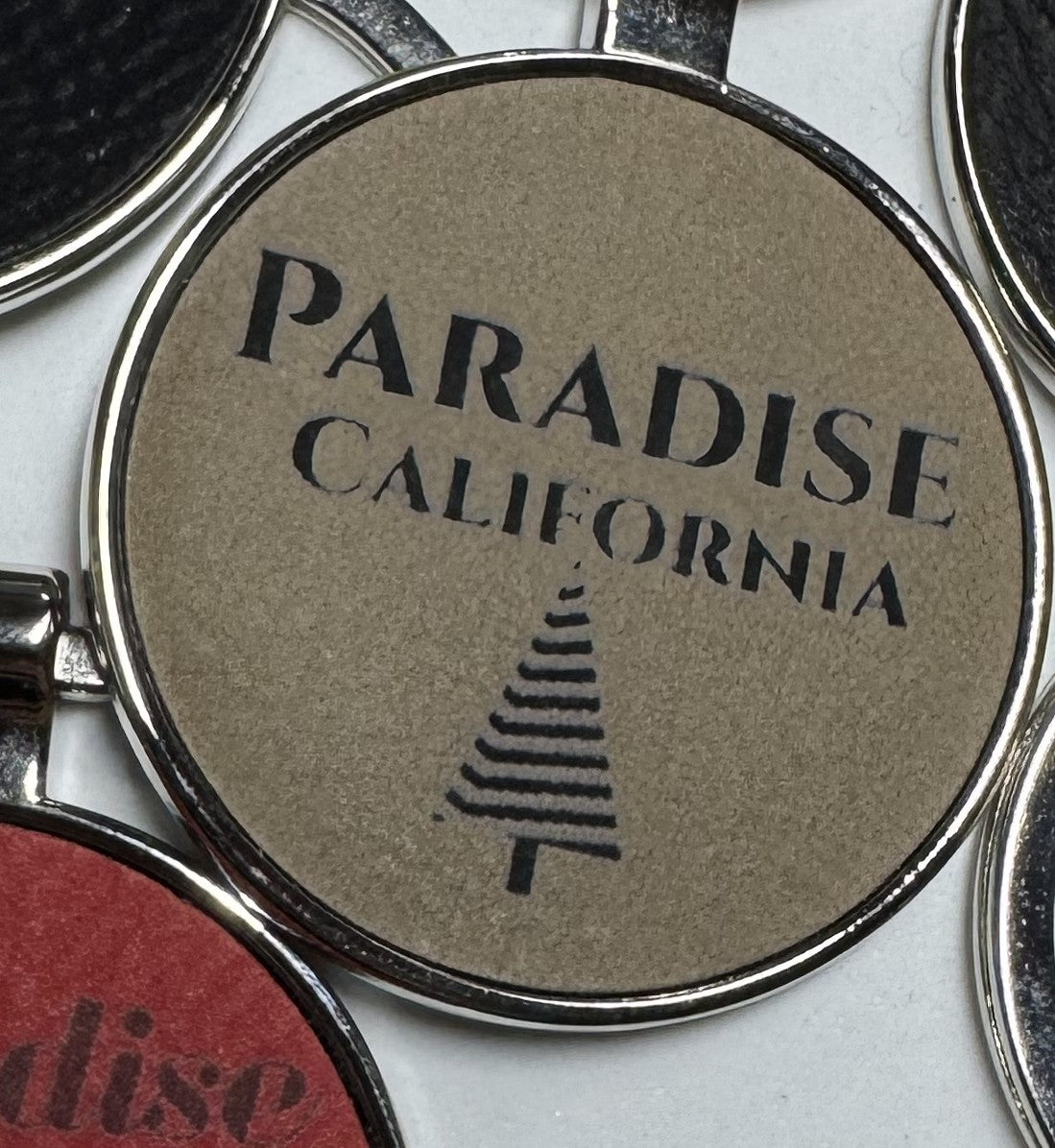 Metal Leatherette Paradise Keychain