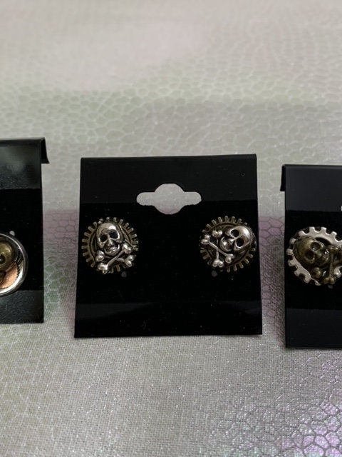 Different Pairs of Steampunk skull stud earrings