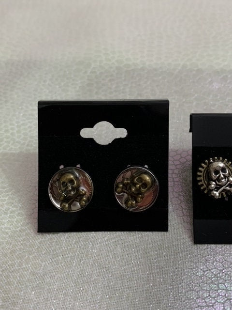 Different Pairs of Steampunk skull stud earrings