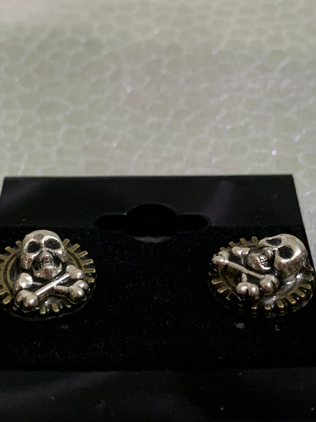 Different Pairs of Steampunk skull stud earrings