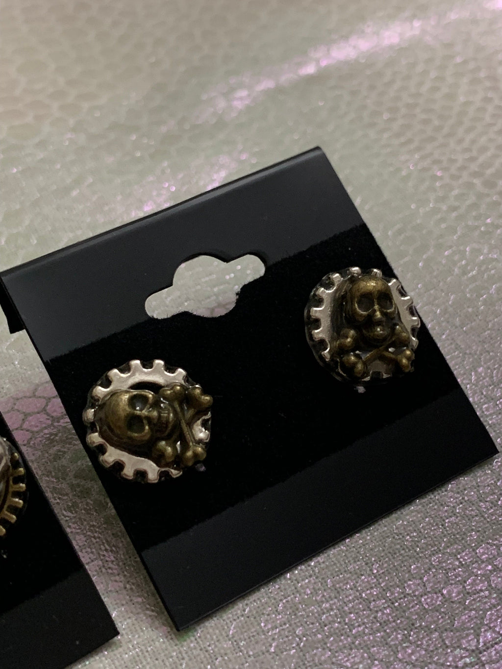 Different Pairs of Steampunk skull stud earrings