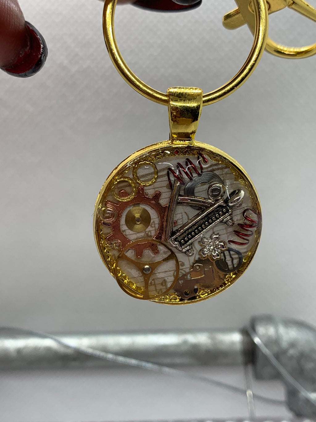 Gold Round Steampunk Piano Keychain