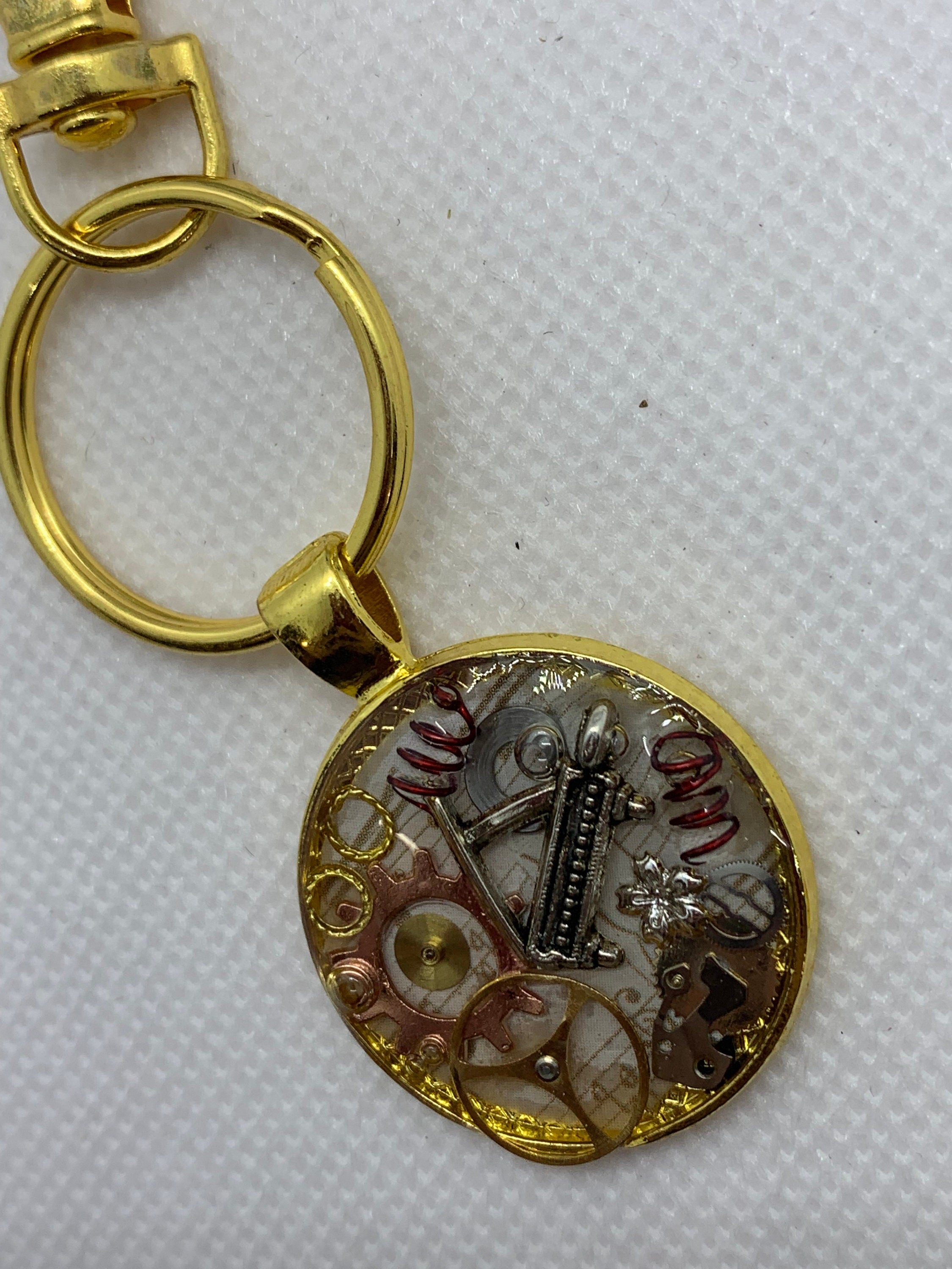 Gold Round Steampunk Piano Keychain
