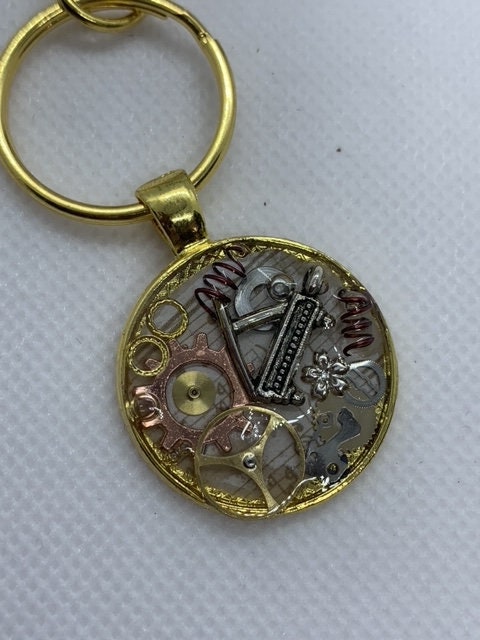 Gold Round Steampunk Piano Keychain
