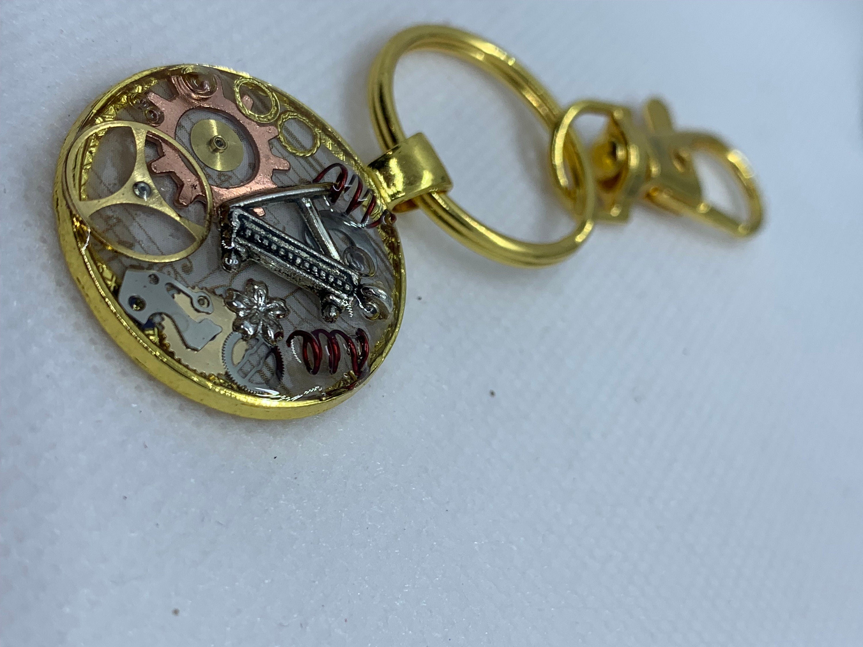Gold Round Steampunk Piano Keychain