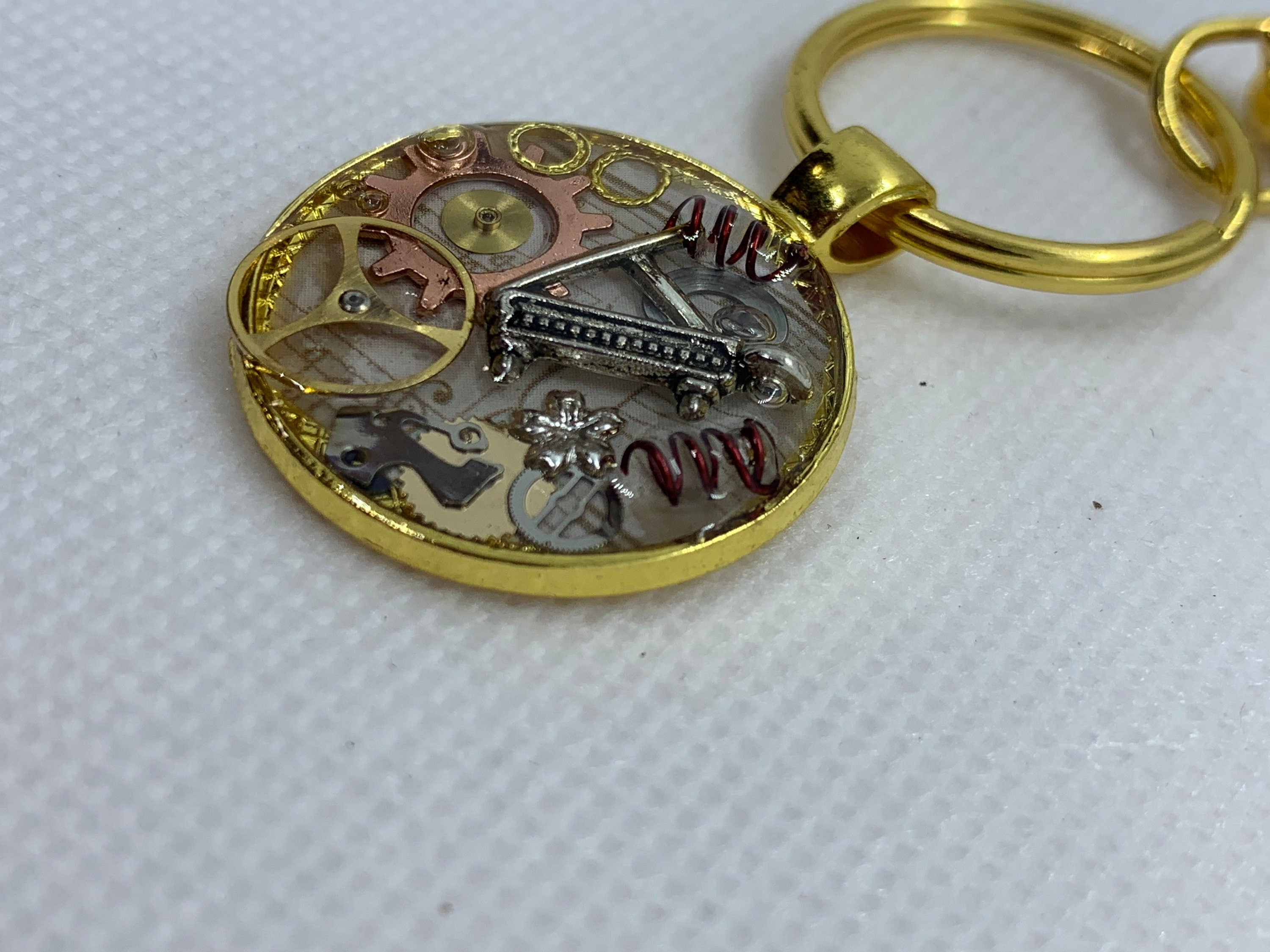 Gold Round Steampunk Piano Keychain