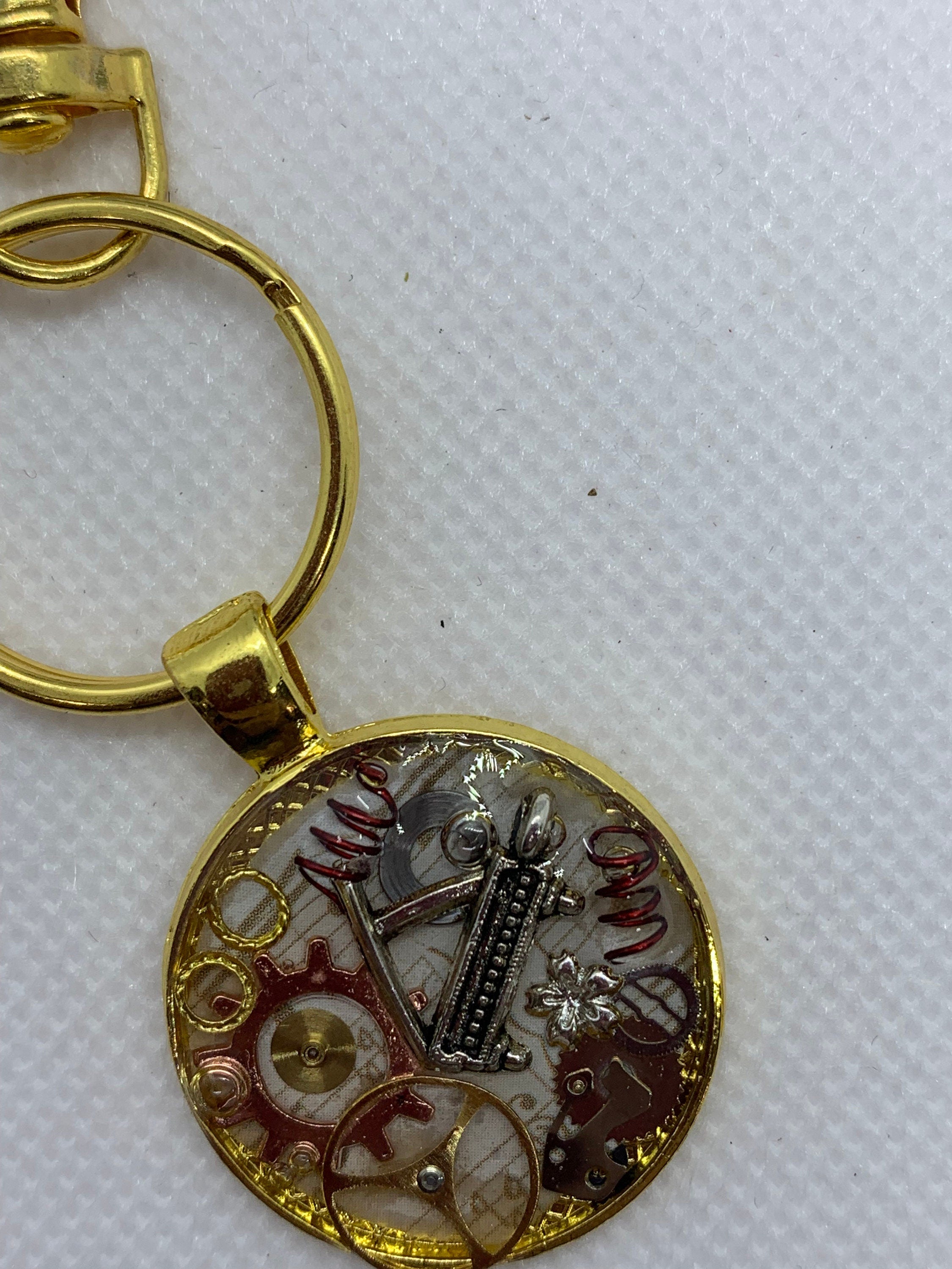 Gold Round Steampunk Piano Keychain